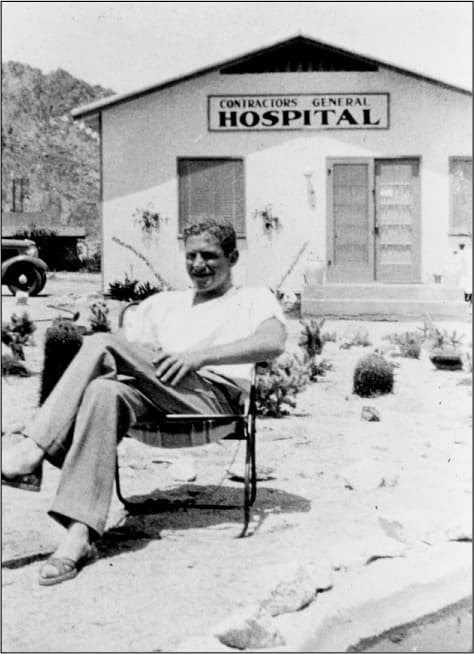 Contractors gather outside Dr. Garfield's desert hospital during the Colorado River Aqueduct project.